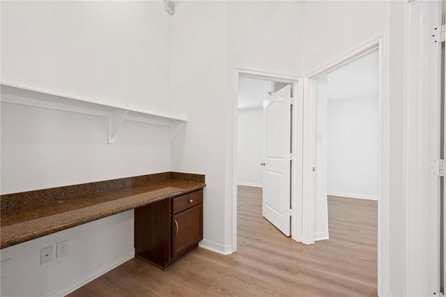 4118 Cedar Creek Ct, College Station, TX 77845 - unfurnished office featuring light wood-style flooring, baseboards, and built in study area
