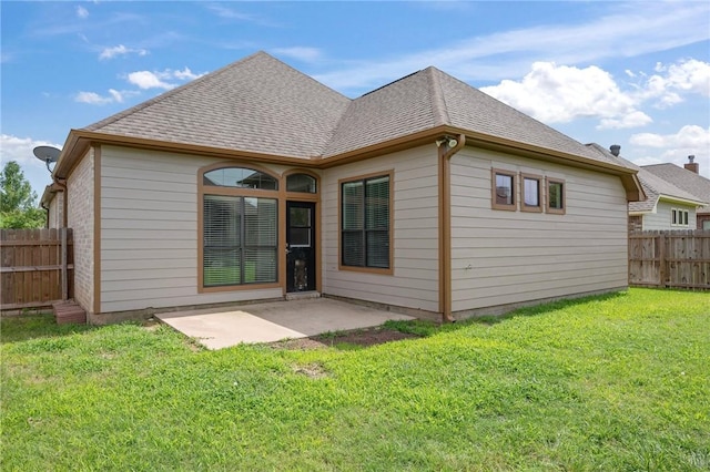 4118 Cedar Creek Ct, College Station, TX 77845 - rear view of house with a patio area and a shingled roof
