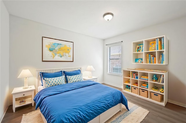 4118 Cedar Creek Ct, College Station, TX 77845 - bedroom with baseboards and wood finished floors