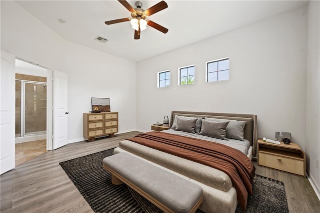 4118 Cedar Creek Ct, College Station, TX 77845 - bedroom featuring wood finished floors, baseboards, ensuite bathroom, and ceiling fan