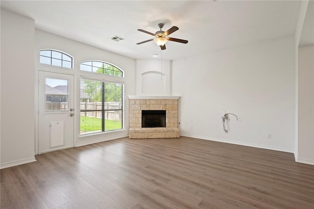 4118 Cedar Creek Ct, College Station, TX 77845 - unfurnished living room with wood finished floors, a ceiling fan, and baseboards