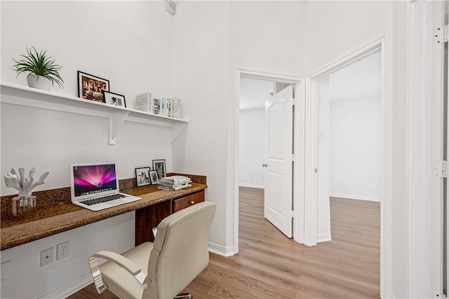 4118 Cedar Creek Ct, College Station, TX 77845 - office with built in desk, light wood-style floors, and baseboards