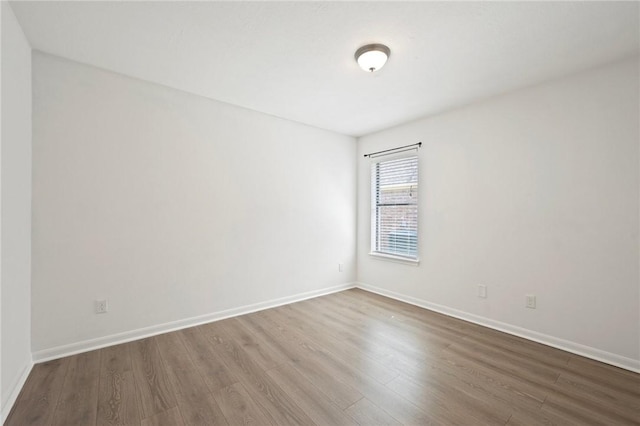 4118 Cedar Creek Ct, College Station, TX 77845 - unfurnished room featuring dark wood-style flooring and baseboards