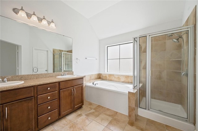 4118 Cedar Creek Ct, College Station, TX 77845 - bathroom with vaulted ceiling, a stall shower, a garden tub, and double vanity