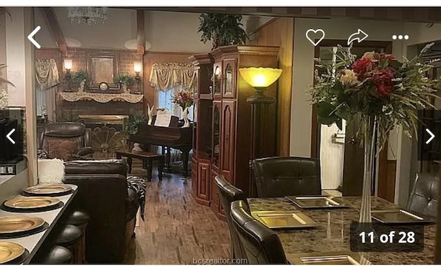 dining area with dark wood-type flooring