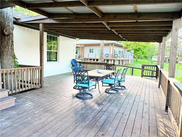 9462 Riley Green Rd, Franklin, TX 77856 - wooden deck featuring outdoor dining space and a lawn
