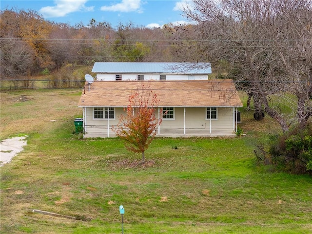 view of outdoor structure with a lawn