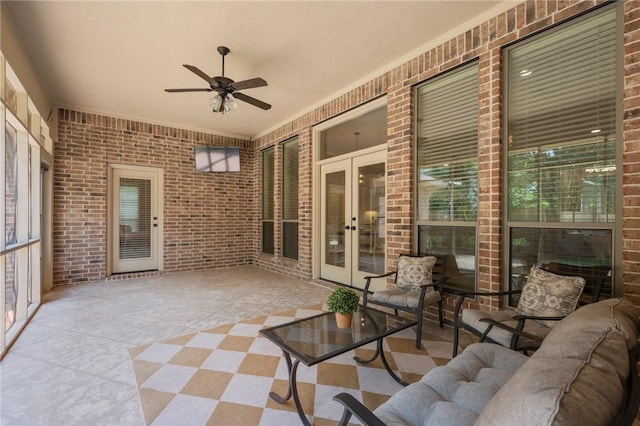 view of patio / terrace with ceiling fan and french doors