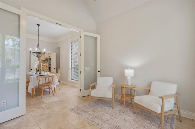 living area featuring crown molding, lofted ceiling, baseboards, a chandelier, and light tile patterned floors
