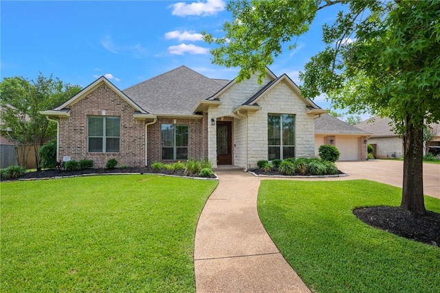 view of front of home with a shingled roof, fence, and a front yard