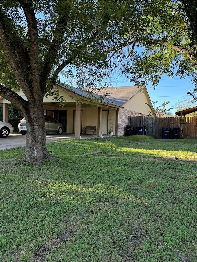 exterior space featuring a carport