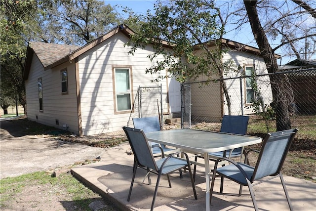 rear view of property featuring a patio