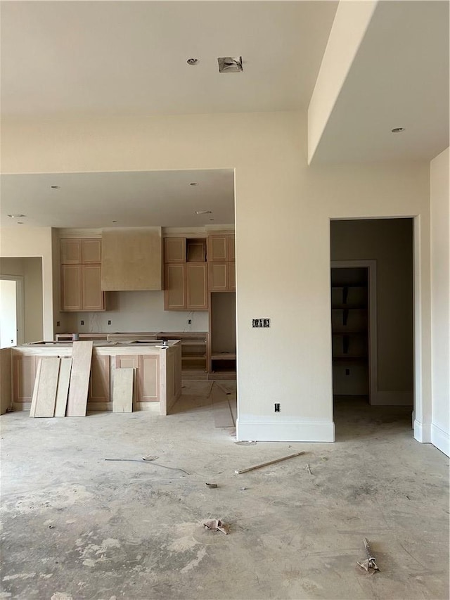 kitchen with light brown cabinetry