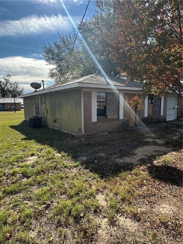 view of property exterior featuring a yard