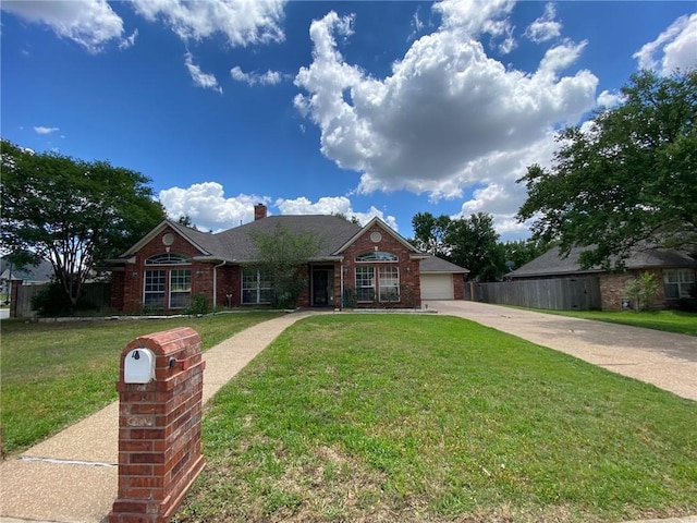 1608 Panther Ln, College Station, TX 77840 - single story home with brick siding, driveway, a garage, a chimney, and roof with shingles