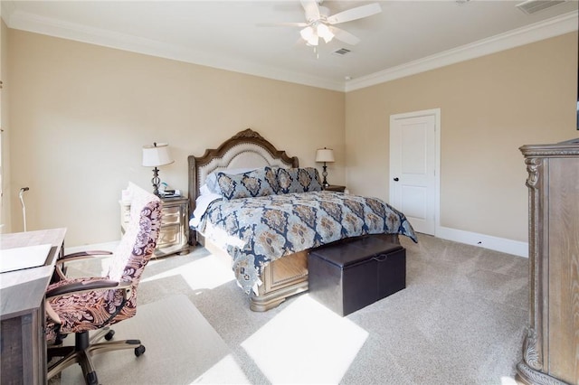 carpeted bedroom featuring ceiling fan and ornamental molding