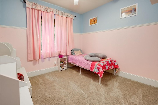 bedroom featuring carpet and ceiling fan