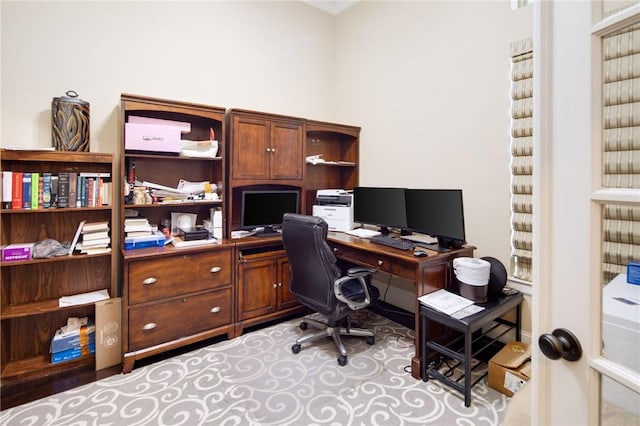 home office featuring light carpet