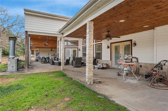 view of patio with ceiling fan and french doors