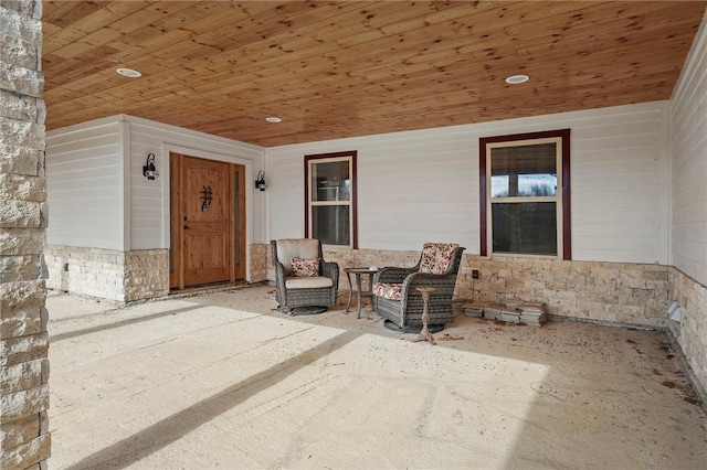 doorway to property featuring a patio area