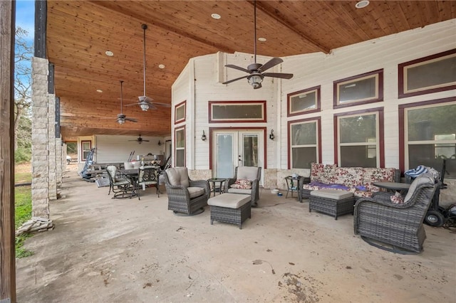 view of patio featuring ceiling fan, an outdoor hangout area, and french doors