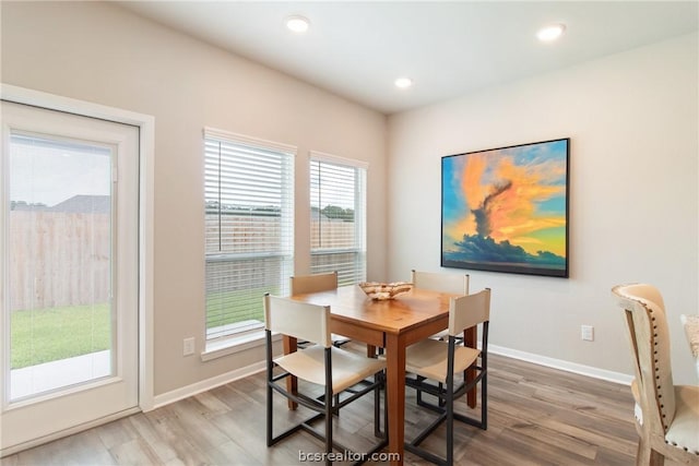 dining area featuring hardwood / wood-style floors and a wealth of natural light