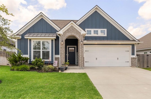 craftsman inspired home featuring board and batten siding, driveway, and brick siding
