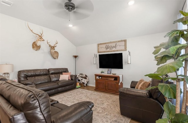 living room with lofted ceiling, a ceiling fan, wood finished floors, recessed lighting, and baseboards