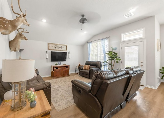living room with vaulted ceiling, a ceiling fan, light wood-style flooring, baseboards, and recessed lighting