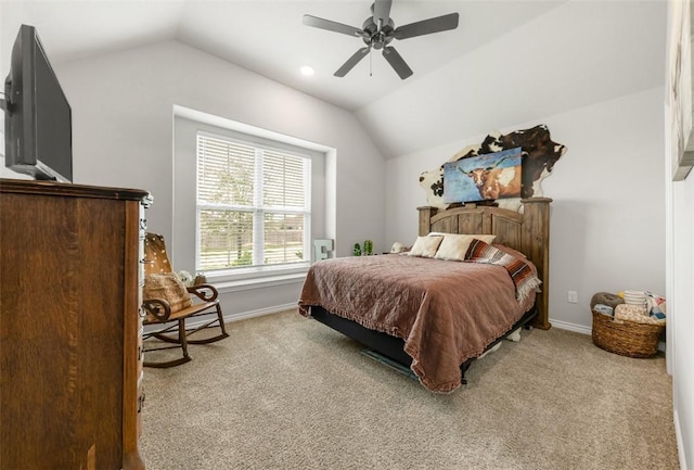bedroom with lofted ceiling, carpet, baseboards, and a ceiling fan