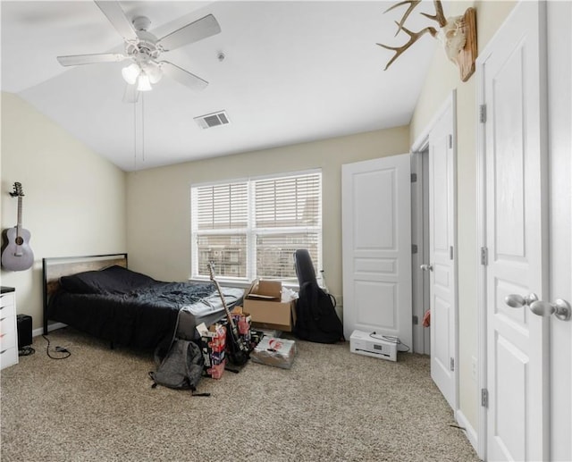 bedroom with visible vents, ceiling fan, baseboards, lofted ceiling, and carpet flooring