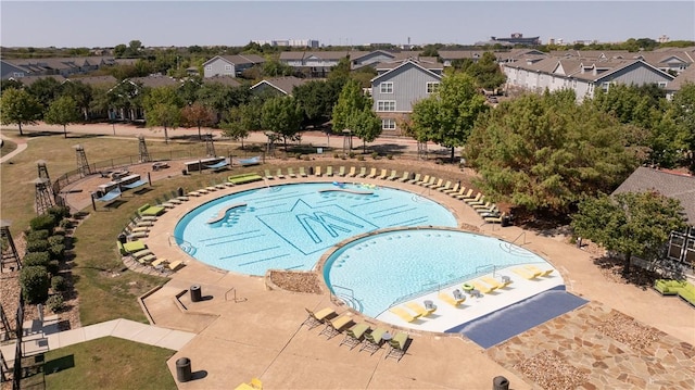 view of pool featuring a residential view