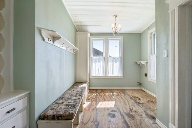 mudroom with baseboards, wood finished floors, and an inviting chandelier