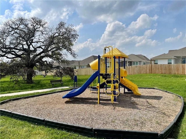 view of play area featuring a lawn