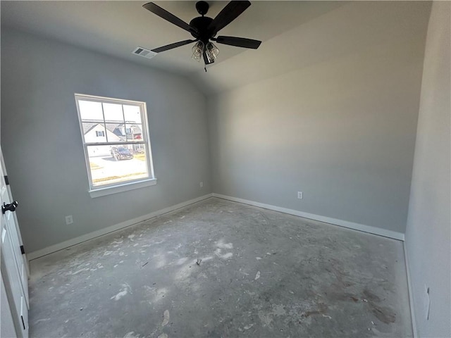 unfurnished room featuring baseboards, visible vents, vaulted ceiling, and a ceiling fan