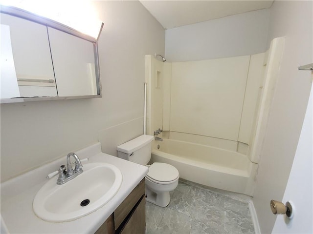 full bathroom featuring bathing tub / shower combination, vanity, and toilet