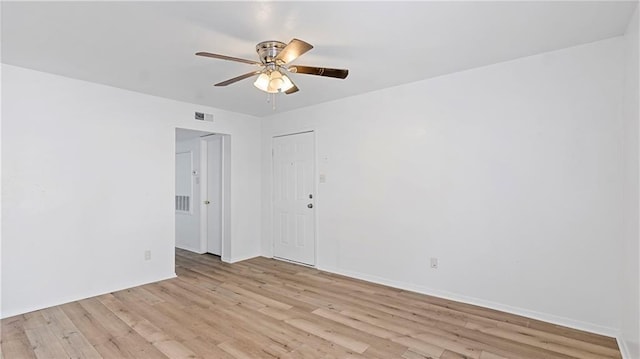 unfurnished room with light hardwood / wood-style floors and ceiling fan