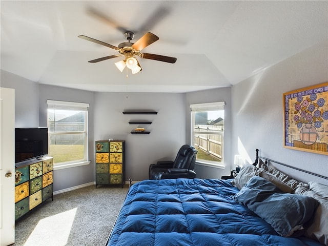 carpeted bedroom featuring ceiling fan and lofted ceiling