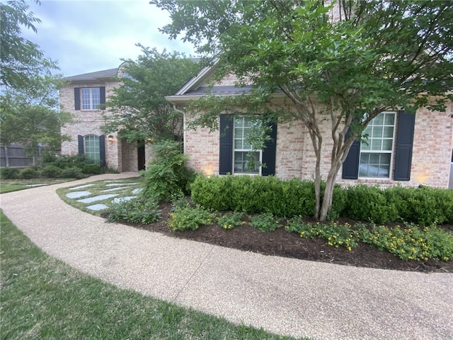 5311 Riviera Ct, College Station, TX 77845 - view of side of home with brick siding