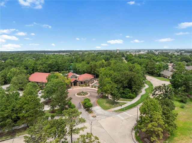 aerial view featuring a view of trees