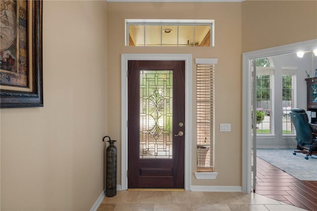 entrance foyer featuring baseboards