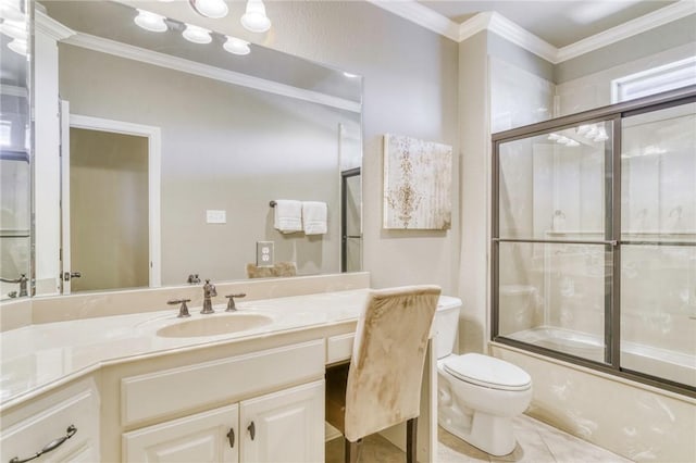bathroom with tile patterned flooring, shower / bath combination with glass door, vanity, toilet, and ornamental molding
