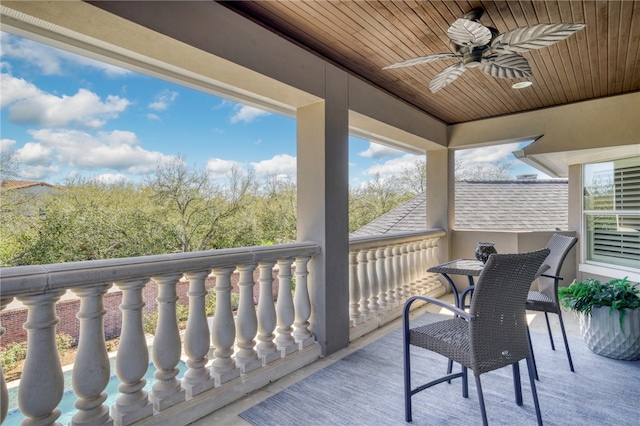 exterior space featuring ceiling fan