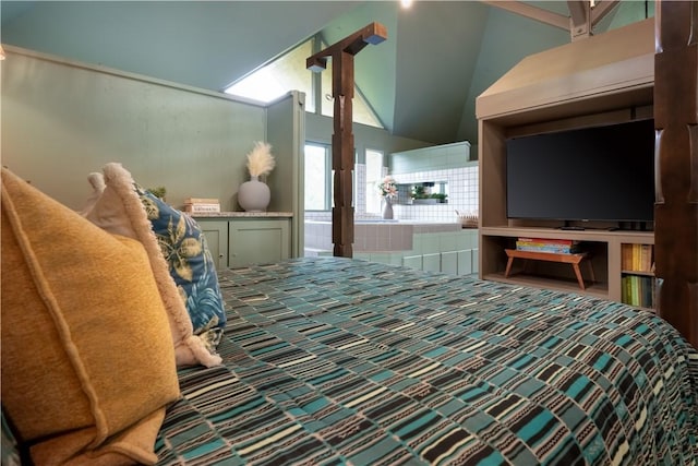 carpeted bedroom featuring lofted ceiling