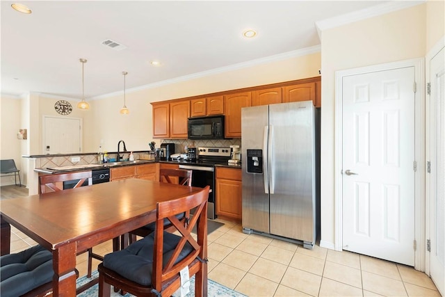 305 Holleman Dr E Unit 202, College Station, TX 77840 - kitchen featuring visible vents, black appliances, a sink, and light tile patterned floors