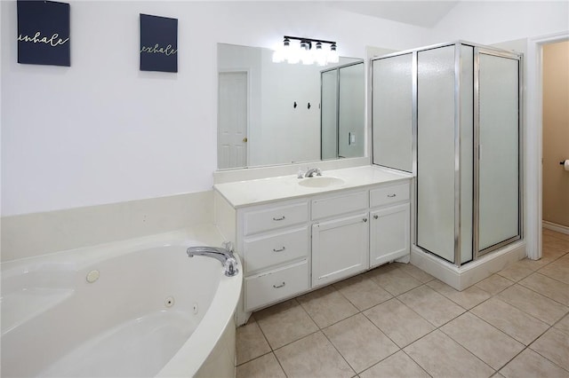 bathroom featuring vanity, tile patterned flooring, and independent shower and bath