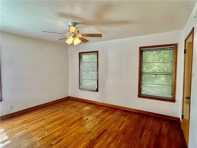 unfurnished room featuring ceiling fan and wood-type flooring