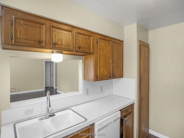 kitchen with dishwasher and sink