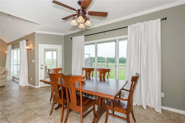 dining space featuring a ceiling fan, baseboards, ornamental molding, and light tile patterned floors