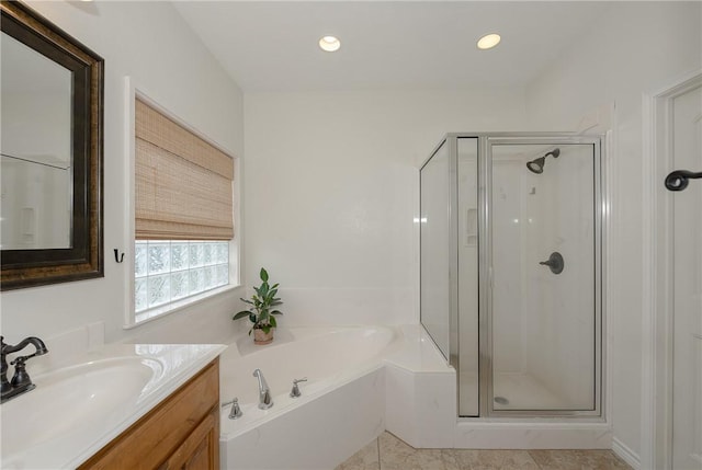 full bathroom featuring recessed lighting, a bath, a shower stall, and vanity